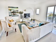 51/80 Hornibrook Esplanade Clontarf Qld 4019 199 m2 of sophisticated residence offering magnificent views of the
Bay
- Living opens onto oceanfront deck and alfresco dining area
- Light filled open plan Lounge, Kitchen and Dining with high ceilings
to capture the cooling breezes
- All bedrooms have balconies, main has walk-in robe and ensuite
- Secure drive in underground parking with 2 carparks
- Complex includes resort style features with in-ground pool, BBQ area
and Gymnasium
- Perfect location minutes from cafes, restaurants and shopping
precinct
- Take in glorious sunsets from the deck or enjoy leisurely walks along
the beautiful beaches outside your front door