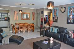 1/66 Spearwood Rd Sadadeen NT 0870 Take a look at this lovely, two bedroom unit that is close to schools, shops and transport. The open plan carpeted and tiled living/dining area is spacious with a reverse cycle air conditioner and also ducted evaporative air conditioning throughout. The kitchen has gas cooking, range hood, double sink, dishwasher and ample cupboard and bench space. The two bedrooms both feature carpet, built in robes and ceiling fans. The main bathroom has a separate bath to shower, vanity and the toilet is separate. Outside you have a great undercover area for entertaining, side gate access to your backyard, undercover carport at your front door and being an end unit, only one side neighbour. - See more at: http://www.professionals.com.au/real-estate/property/742635/for-sale/unit/nt/sadadeen-870/1-66-spearwood-road/#sthash.HeL9Ewid.dpuf