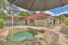 9 Worth Ct Upper Coomera QLD 4209 Welcome to the most jam packed, feature filled, suburban family home
available on the market. In need of something that fits your family,
friends, pets and the hobbies... this is the home that fits the bill,
and it's well worth it! Quality, space, location, price and charming
family appeal are just a few of the superior features this home is
packed with. * Four large sized family bedrooms. The spacious
master has a large walk-in wardrobe, a large private ensuite and windows
that overlook your private pool area and surrounding bushland. * Impressively well kept and not a thing to do but move in and enjoy easy living. *
Two large internal living areas comprising of a completely separate
formal lounge or children's rumpus room at one end of the residence and
an open plan dining/kitchen combination that overlooks your sheltered
rear yards. This floor plan has been perfectly planned to provide for
the various needs of an expanding family. * You will find a huge
central kitchen that will excite every buyer, equipped with modern
appliances, great storage space, large counter tops and stylish decor. *
The bedrooms have also been well arranged, with a separate 4th bedroom
or home office at the front of the home, this room has sliding doors out
to the side yard space and is perfect for overseas guests, homework
area or study. The remaining 2 double sized children's bedrooms are both
spacious and flooded with natural light. The large master bedroom is
positioned to the rear of the property and has been fitted with a
stylish private ensuite and walk-in robe. * Complimenting the whole
home is a beautiful tranquil private in-ground swimming pool area with
solar heating, private outlook and adjoining massive undercover alfresco
area for summer barbeques. * Secluded 1000sqm flat battleaxe block
that offers wonderful side access, room for a shed, off street parking
(in addition to the double lockup garage) ideal for boats, caravan or
any hobby that requires space. * Flawless low maintenance landscaping, flat yard space for the children or pets and no neighbours means absolute privacy! *
Additional features include: ducted air conditioning, impeccable
condition, ceiling fans throughout, security screens, rain water tank
and garden shed just to name a few. *Located in a modern and quiet
pocket of Upper Coomera, this impeccable home is a wonderful place to
raise your family. Public transport comes right to estate entrance with
approximately nine local schools within a 10 minute drive, shops, parks,
waterways, medical centres, train, M1 motorway, equestrian centres,
restaurants, child care, public swimming pools, you name it. To top it
all off, this home is situated in a quiet and family friendly
cul-de-sac. All in all the most impressive element this home is
its overall lifestyle appeal and set up to accommodate any buyer's
needs... a home like this, packed with so many assets will likely draw
the eye of many buyers, so pick up the phone and arrange an inspection
soon!