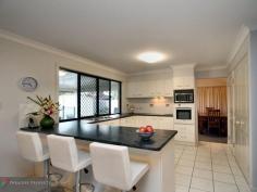 19 Cocoparra Crescent Parkinson Qld 4115 2 HOMES FOR THE PRICE OF 1 This outstanding property is designed for entertaining and dual living both at the same time. Offering versatility and functionality to suit the changing needs of your family - here you have 2 homes in 1 with a fully self-contained guest wing downstairs. Ideal for: *Elderly parents wanting independence but having you close by *Teenager retreat where they have their space and you have yours *Extra family or guests staying over *Extra living for the big family *Home-based business Packed full of features, here are some fast facts: MAIN LIVING: *4 good-sized upstairs bedrooms (all with BIRs) - including a massive air-conditioned master bedroom with WIR + European-style en-suite with spa bath, double vanity and separate toilet *Central modern kitchen with quality appliances, heaps of bench/cupboard space, triple pantry + dishwasher *Formal living and dining with impressive high raked ceilings *Family/casual meals area *Main bathroom with bath + separate shower GUEST WING: *Kitchenette with heaps of storage *Casual dining/meals area *Air-conditioned formal living with separate entry for complete independence *Full bathroom with shower + toilet *Spacious master bedroom with twin BIRs *Separate access to outdoor entertaining EXTRA FEATURES of this unique property include: *Massive wrap-around insulated patio with quality shade blinds *Solar-heated saltwater pool with giggle seat + cascading waterfall - bordered by sandstone paving and glass panel fencing *Massive poolside umbrella + built-in BBQ *Double garage with built-in laundry *Fully-enclosed and gated back yard for the kids to play safely *Quality 5kw solar-power system *2 garden sheds *5,000 litre water tank + pump *Security alarm + security screens on all doors/windows This fantastic north-facing property is situated on a big 830 sqm block and just a short stroll to city-express bus, walkways and parkland. It offers so much potential, versatility and opportunity. Only an inspection will reveal how it all comes together. Properties like this are hard to find. So be quick to inspect - call for an appointment at any time - or view at open house.