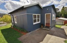 14 Wilga St Bondi NSW 2026 This cute original Captains Flat miners cottage is an excellent investment or first home. The property was built in the 1940s by the Mining company, Lake George Mines. It was one of 152 homes built to accomodate married miners. Built with hardwood frames and iron roof, this fibro cottage has been freshly decorated and has manicured gardens. We expect to see 280 to 300 dollars per week for rental. When you first see the home, Georgian timber windows feature alongside the entrance steps and balustrade. The living room is bright and full of character. The picture rail, panelled ceiling and the timber windows are all freshly decorated and add to the cottage features. There are two great size bedrooms, one bedroom has direct access to the two way bathroom. A large kitchen has plenty bench space and flows through to the large laundry, separate toilet and back porch.The property has recently had installed a reverse cycle air con unit,which is great for summer and winter.
