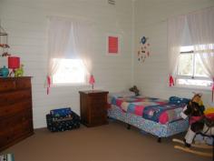 1 Conlon St Quirindi NSW 2343 3 bedroom weatherboard home, freshly painted and fully renovated. Situated on a large 954.8sqm block in a quiet location. All bedrooms have ceiling fans and ducted evaporative air conditioning throughout. Wide timber verandahs on Northern and Western side. Open plan kitchen/dining area ,living area and bedrooms carpeted. Ducted evaporative air conditioning and slow combustion wood heater in living area. New double lockable garage with cement floor as well as carport. This is a large block of land , fully renovated home ,set in a quiet street. Great value , would suit first home buyer or investor, well worth inspection.