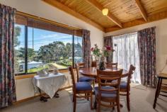29 Kent St Geeveston TAS 7116 Cosy Country Cottage Warm and welcoming 3 bedroom, 2 bathroom home set on the high side of the road capturing all day sunshine, situated on a gently sloping 1211m2 lot. The open plan design creates generous living space from the kitchen/dining to the lounge area. Large windows to capture sunshine and rural views. Reverse cycle heat pump and wood heating for year round comfort. Upgraded bathroom, light and bright kitchen with good sized pantry. Single garage, spacious grounds and gardens, sunny deck to relax and admire the views. Within walking distance to township, school and public transport. Quaint country cottage in popular tourist township in the picturesque Huon Valley.