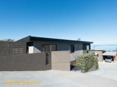 1/33 Waverley Street, Bellerive TAS 7018 This modern family home enjoys breathtaking panoramic views of the Derwent River and the Mountain beyond from its highly sought after location. Set over two levels to maximise practical living spaces it offers a stunning outlook from the upstairs living and dining area, a generous kitchen that has been well designed and features top end appliances, ample bench and cupboard space and a private sitting area adjacent. Generous decks and paved entertainment areas have been set out around this home to make the most of all weather entertaining.