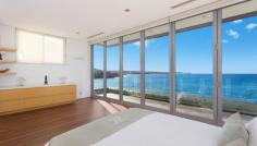 30 Marine Parade Lurline Bay NSW 2035 A stunning architecturally designed waterfront residence
Beautifully situated on the northern cliff top of the
exclusive Lurline Bay is this absolutely stunning waterfront residence.
Crafted by leading architect Timothy Hadiwibawa, the sophisticated
contemporary design compliments the unrivalled uninterrupted views that
stretch along the rugged coastline to the sandy shores on Bondi beach.
Impeccably appointed throughout this breathtaking offering is the
epitome of luxurious coastal living. Merely moments to the natural Mahon
ocean bath, Jack Vanny reserve and the glorious Maroubra Beach. - Generous open lounge and dining area flow to a sun-drenched north facing entertaining terrace - Deluxe gas kitchen equipped with Gaggenau appliances - Heated plunge pool, private rear courtyard - Master bedroom has uninterrupted ocean views and private terrace - Unfinished marble feature wall, timber blackbutt flooring, security alarm, reverse cycle air - Double lock up garage with internal access, ample storage - An enviable ocean front reserve position on the stunning coastline path - Land size 518 sqm Approximately - Council $5,195.85 per annum - Water $176.61 per quarter - Jason Black 0414 891 797 or Brent Foster 0411 032 474