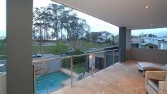 8-10 Kambah Pl Reedy Creek QLD 4227 STYLE FOR HARMONIOUS INDOOR/ OUTDOOR LIVING $999,000 Web property id: CBS583 Elevated within the heart of ‘The Observatory’, this master built Sanctuary 28 residence presents two levels of contemporary living appointed to the highest standards. Enjoy the peaceful park surroundings. • Beautiful formal lounge/dining area has spotted gum floors • Entertaining area enjoys a sparkling pool outdoor shower and park views • Caesar Stone bench tops, kitchen equipped with Smeg appliances • Family bedroom wing enjoys a stylishly appointed bathroom • Top floor main has an opulant ensuite and a large deck overlooking Surfers Skyline views. • Sounproof hobby/rumpus room plus an Italian tiled family living area • Air conditioned, Vacuum Maid, intercom and surround sound • Toowoomba sandstone paving plus landscaped gardens and lawn • Triple car garaging, plus extra space for a van/boat • Set on a 1,143sqm block opposite parklands Located within minutes drive to private and public schools, public transport, Varsity Train Station ,Local Shopping Centre and 20 mins to Burleigh Beach.