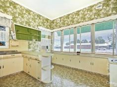 1 Australian Ave Clovelly Park SA 5042 VINTAGE GEM WITH POTENTIAL PLUS! 710SQM CORNER ALLOTMENT (APPROX.) Inspection Times: Sun 14/09/2014 01:30 PM to 02:15 PM OPEN FOR INSPECTION SATURDAY 13TH SEPTEMBER 11:30AM - 12:00PM AND SUNDAY 14TH SEPTEMBER 1:30PM - 2:15PM What a rare and perfectly preserved treasure from a bygone era! Buyers with retro tastes will fall in love with the gorgeous vintage style of this unique two bedroom home, which sits on a corner allotment in a great location just 11 kilometres from the city. The house itself offers plenty of potential for updating and renovation, although you might may retain some of those classic features which are very much on-trend right now. If you're thinking bigger, the huge allotment also lends itself to development, subject to council approval. An entry hallway opens to a large carpeted living/dining room with reverse cycle air-conditioning, ceiling fan, lovely big picture windows with decorative pelmets, and glass double doors with a funky art deco design. Stepping into the kitchen evokes a wave of nostalgia. The original decor - including wallpaper, lino flooring, ornate glass breakfast bar and glass-fronted cabinets - have been amazingly well-maintained. There's also an electric cooker and a surprising amount of cupboard storage. Equally eye-catching is the bathroom, with its original mint-green basin, deep bath, tiling and separate shower. Next to it is the toilet and a generous laundry with loads of storage. The large main bedroom has a floor-to-ceiling built-in robe and a window seat with built-in storage underneath, while the adjacent second bedroom has a built-in robe and desk. Both include air-conditioning units for year-round comfort. There's a neat front garden with side access to the yard via double gates. At the back of the house is a paved and shaded entertainment area which leads to the large garden with paved pathways weaving their way among established plants and trees. The property also has a single garage. This rare property – which was clearly someone's pride and joy for many decades - really does present an opportunity too good to miss in a location close to the city, schools, Marion shopping centre and public transport (Mitchell Park Railway is just a 1km walk away).