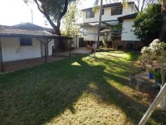 230 Cornelia Road Toongabbie NSW 2146 Presentable spacious 5bdrm family home -Corner site 632m2 Dual Occupancy (STCA) Well presented two storey family home with lock up garage, situated on a corner 632m2 block. Whilst being within a short stroll to Metella rd Public School, and Transport. Featuring, Spacious living throughout, with hallway entrance that leads out to welcoming lounge room, (with high ceilings and timber flooring) that flows out to a good size kitchen, which in turn offers ample bench and cupboard space, together with an additional dining area Consisting of 5 good size bedrooms (with 3bdrms featuring mirrored built/ins and ensuite to master). Plus a huge upstairs rumpus room, with its own balcony. Ideal for teenagers, 2nd living area, games room, etc. Also offering renovated bathroom, with 3rd toilet in laundry. Private and secure rear yard, with colourbond fencing. Loads of space for family pets, or outdoor activities. Ample off street parking with lock up garage, plus side access to rear yard ideal for boats, caravans, etc.In addition dual/joining driveway available at front of property (has its own side street entrance) General Features Property Type: House Bedrooms: 5 Bathrooms: 2