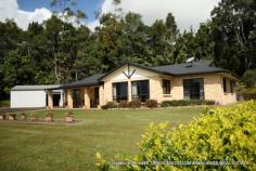 Malanda, QLD 4885 Consider this modern, elegant four-bedroom home on 1 hectare (2.5 acres) in a select area close to Malanda. This neatly presented brick veneer home is surrounded by sweeping tracts of lawn, established retained gardens and is framed by a rainforest backdrop. A bitumen driveway from the front gate to the house and two-bay shed keeps maintenance and mess during the wet weather to an absolute minimum. The kitchen with good storage including pantry and a stunning feature timber bench-top overlooks the verandah; the ideal spot for al fresco dining to enjoy the manicured surrounds. Practical tiles cover all living and wet areas with bedrooms having the added comfort of carpeted floors. The property is on town water but also has rainwater supply. There’s not a thing out of place here; beautifully presented, conveniently located – inspect today and make an offer! 1 Ha (2.5 acres) 4 brms; 4 built in Brick veneer Lowset; steel framed 1 bathroom 2 Verandahs Fenced Gas HW Ceiling fans 2 bay shed Garden shed Town water Rainwater Veg garden