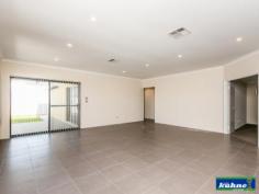 6 Grasswren Way Alkimos WA 6038 Sell With Sell presents to you....This stunning new executive residence located in the sort after “ALKIMOS BEACH ESTATE” This home has been designed and finished to a standard that is beyond words.” Just Perfect”. Straight This immaculately presented 4 bedroom, 2 bathroom plus games and entertainment room home is the one for you. Once you walk through the entry step on to the beautiful flooring you will instantly be taken away with pure bliss. The master bedroom with walk in robe and ensuite built for a king and queen will draw you in with its relaxing decor and feel. The 2nd, 3rd, & 4th bedrooms all have built in robes and are more than double sized. The massive second bathroom is squeaky clean and the laundry has direct access to the utility area which is hidden from view. Walking through you enter in to the over sized dining, kitchen and family areas which are open plan and look out on to the alfresco. The games room that has sliding doors out to the alfresco could easily be used as the 5th bedroom or guest accommodation. The state of the art kitchen has been designed with a lot of thought for the astute cook and is just to die for complete with top appliances. All windows have been tastefully and elegantly furnished which gives all rooms and living areas a warm and inviting feel. The ducted zoned reverse cycle heating and cooling throughout the entire home will help you snuggle up to on those cold winter nights as well as sit back and relax on those hot summer nights. Not to mention the solar hot water AND solar panels to help out with the power bill.