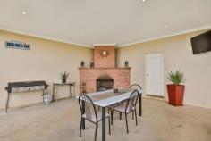 29 Derna Road Robinvale Vic 3549 Not only are there heaps of rooms but they're all much larger than average. Set on approx. 1 acre is this 4 year old 50.4 sqm UMR home. 3 large bedrooms - BIR plus Master with over sized ensuite. Kitchen features chef's stove, huge WI pantry & loads of bench space. The open dining & family area overlook the grassed fully fenced yard. Formal entry & Sep lounge room, also a TV room/study. Sweeping verandas, 3 phase ducted R/C air con, Dbl garage with extra toilet. Space for a vegie garden under watering system. Water storage is no problem with 2 x 23,000lt tanks to cater for your 3 Megs & rain water. The entertainment area comes complete with BI brick fireplace. To complete this package is the man shed approx 7.5 x 12m, concrete floor, kitchenette, 3 phase power. A real man's cave!. You will find all this & so much more on this property. Only minutes from Robinvale. An inspection will impress.