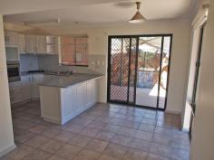 4/5 Aneura Pl Sadadeen NT 0870 This unit is too good to pass up with the First Home Buyer Grant coming to an end in December 2014. Get in before the end of the year to get your $25,000 grant! You will feel the benefit in your back pocket of a privately managed body corporate. With this you are essentially just paying the raw costs of water and insurance and none of the other costs that come with a managed unit complex. Positioned at the back of the complex and sitting on a hill, this great two bedroom townhouse is worth a look for both its great design and great views! The open plan tiled living/dining and kitchen boasts ducted evaporative air conditioning throughout and ceiling fan. Downstairs the internal laundry also has an extra toilet. The kitchen features gas cooktop and oven, plenty of cupboard and bench top space and sliding door that leads out to the backyard. Upstairs the main spacious bedroom boast ceiling fan, built in robes, carpet and large private balcony with fabulous views of the Ranges. The other bedroom also features ceiling fan, split air con, built in robes and carpet. The central bathroom has bath over shower, vanity and toilet inclusive. Outside, the veranda runs along the front and continues around the side so there is plenty of choice of where to sit and enjoy the outdoors. There's enough room for a vege patch too. The unit features a single car spot with plenty of other parking spots and the benefit of a privately managed body corporate which will help keep your costs down! Call for a viewing today!
