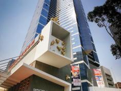 6003/7 Riverside Quay Southbank VIC 3006 Maximising wraparound Albert Park, MCG, Botanical Garden views to bay view, this resort style skyhome reveals a scenic retreat graced with a cleverly integrated in/outdoor design to bask in the vibrancy of Melbourne from each and every window. The defined living and dining areas capture picture views and soak up an abundance of natural light. An open granite kitchen is equipped with Miele appliances and seamless cabinetry. Residents enjoy access to a premier selection of facilities including a gymnasium, pool, sauna, private cinema, 24 hour concierge and video intercom and lift access. The double-sized bedroom includes wide built-in wardrobes and direct access to a stylish ensuite. Additional features include a separated laundry, guest powder room, ducted air conditioning, chic downlights and single carport. It represents a remarkable investment opportunity for those seeking an unparalleled lifestyle location with popular demand and a high rental yield. It is proudly set on the 60th floor and enviably located within easy walking distance to sports venues, Crown Casino, Arts precinct, Southbank shops, cafs, restaurants and transport options.