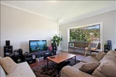 21 Mugga Way Tweed Heads NSW 2485 Leafy Tweed Cottage in Great Location Situated
on a corner block just a 300m walk to the waterfront canals of Tweed
Heads is this charming three bedroom cottage which will suit those
looking to add their own touches. The living space is open and features a
bay window which takes in the leafy views of Dock Island. There is a
dining space is just off the kitchen which opens to the rear deck -
Ideal for summer BBQ's and family functions. A modern and well-appointed
kitchen will suit the fussiest of home cooks, with stainless steel
appliances and electric cooking plus space for a large fridge. Just off
the kitchen you have access to a separate internal laundry which opens
onto the sunny rear deck. Three spacious bedrooms feature built in
robes; the main bedroom with its own access to a small balcony at the
front of the home. The neat bathroom is located close to bedroom two and
three with modern vanity and glass shower door. On the lower level you
will find a single car space, with plenty of under house storage space
where you can easily transform into a workshop area for the home handy
man. The concreted driveway provides plenty of space for off street
parking for additional vehicles. This is a wonderful opportunity to take
advantage of the lifestyle that is on offer here. We welcome your call
to inspect this property to really appreciate the potential and
lifestyle it offers. Property Features & Amenities General Features Property Type: Residential Bedrooms: 3 Bathrooms: 1 Parking: 1