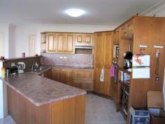 11 Melbourne Ct Calliope QLD 4680 Price $375,000 Suburb Calliope Postcode 4680 Property Type House Bedrooms 4 Bathrooms 2 Carspaces 6 Land Size 857 Square Metres DON'T LET THIS ONE GET AWAY! The packing has begun! This property is genuinely on the market to be sold. Priced accordingly in a fantastic cul de sac location, backing onto bushland on a large 857m2 block this home ticks the boxes. Features Include: * Tasmanian oak kitchen. Large corner pantry + great storage. Open to the tiled family room. * Front lounge room with access to the front verandah. * 3 or 4 bedrooms. Built in robes. Walk in robe and ensuite to master bedroom. * Rumpus room or 4th bedroom. * Family sized bathroom. Separate toilet. * Huge laundry with great workspace and storage. * Copious amount of hallway storage cupboards. * Multitude of entertainment options. Sit on the front verandah and watch the kids play or utilize the great side deck for the larger gathering or simply enjoy the view from the back verandah which overlooks the bushland at your boundary. * Additional storage underneath the home. * 6x6m Shed with power. * Fully fenced block. Serious sellers. Is this your new home? Call Stacey Marjoram 0438 728 769.