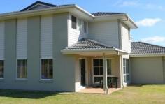 4 Bishopwood Court Upper Coomera Qld 4209 This beautiful home features - downstairs - open plan study, open plan kitchen with plenty of cupboard space, the latest in stainless steel appliances including a gas cooker, stainless steel dishwasher. Separate tiled dining and lounge room, powder room, separate laundry. Upstairs - family room, master bedroom with walk in robe, ensuite with double basins and private balcony, modern family bathroom with bath tub, all other bedrooms have built in robes. This home has full ducted air conditioning, vacuum maid system and alarm system. Under cover patio area, large fully fenced backyard, double lock up garage. Close to schools, parks, Upper Coomera City Centre and the M1.