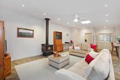 32 Wandarra Way Warranwood VIC 3134 4333Price Guide: More than $670,000 | Land: 652 sqm approx | Type: House | ID #111891 Barry Plant Ringwood T 03 9870 5555 EMAIL OFFICE Nicole Freene T 03 9870 5555 | M 0448 877 387 EMAIL AGENT Aaron Chuah T 03 9870 5555 | M 0408 828 000 EMAIL AGENT Details Map/Directions Area profile Carefully Designed To Offer The Ultimate Family Lifestyle From its quiet cul de sac location to the carefully planned two-storey floorplan, much thought has gone into creating this gem of a home that truly offers the ultimate family lifestyle. Careful consideration has gone into every aspect of this home to ensure its durability for everyday family living and ability to entertain on a very grand scale. It's therefore no surprise to note that large families are comfortably catered for within this space-laden home, which boasts three separate living areas along with a magnificent entertaining terrace that's virtually another room in itself! The home's grand persona is portrayed in the flowing sense of space shared by each of its radiant living areas, which maximise space and suited for a host of living requirements. Evoking the charm of a country lifestyle with its leafy surrounds and tranquil ambience, leadlight windows adorning the top of large, frameless windows are definitely in keeping with the home's period-inspired theme. Grand open-plan living with a large, well-appointed kitchen and family living with wood combustion fireplace makes for a superb centrepiece and combines with the spectacular wrap around deck that floats amongst the treetops, delivering the perfect indoor-outdoor entertaining set-up or peaceful sanctuary for that afternoon escape. While on the topic of peaceful sanctuaries, the light-filled formal lounge (with adjacent dining) frames pleasant front garden views as you unwind with a book in hand; teenagers, meanwhile, have a downstairs retreat to call their own. And with its own entrance, access to a large bedroom (with built-in robes) and brand new bathroom facilities on hand, it's also dressed with the flexibility of multi-generational living. Bedrooms of generous proportions delight with their comfort and space, while a huge amount of storage in and around the home promotes clutter-free living. Finished with gas ducted heating plus split-system heating and cooling and boasting a family-friendly location within excellent access of well-regarded private schools, scenic parkland, Eastland Shopping Centre and Eastlink