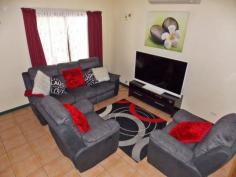 7/4 Aneura Pl Sadadeen NT 0870 Situated in the Sadadeen area close to schools, shops and transport is this end three level townhouse. The unit is almost at the top of the block with fabulous views of the surrounding areas and MacDonnel Ranges. Entry is to the front verandah which can double as a 2nd outdoor living area. The lounge area is tiled, boasts a reverse cycle air conditioner and has a handy storage area under the stairwell. The spacious second level area is tiled with the kitchen having electric cooking, dishwasher and ample cupboard and bench top space. The internal laundry is on this level as well and also a second toilet. Up the stairs to the top level you will find two bedrooms both with carpet and built in wardrobes. The main bathroom has shower over bath, vanity and toilet inclusive. Your private courtyard is paved and has a lovely shaded timber pergola and there is a side gate that allows you access to your unit from the side.