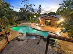 906 Pacific Hwy Berowra NSW 2081 Huge Level Land with Resort Style Home! A One of a Kind Surprise Package! Positioned in a tranquil & unique setting, well away from the highway on a private road, this once in a lifetime opportunity exits for an astute buyer to create their own oasis with the added bonus of running a home business. Features include: Lush tropical established gardens Large level land - 2426sqm Private road - secluded location Spacious living & entertaining areas Separate home office & workshop Gas heating for Resort sized pool with rock feature & water slide Gourmet kitchen - European appliances including steamer oven Built in coffee machine In ground watering system for gardens Lighting in garden and pool Area Front garden with fish pond, bridge and a creek. Storage area at rear of shed 2 Bird aviaries, billiard table. Children's play equipment Inclusions: TV's and home theatre, indoor and outdoor speakers, Built in coffee machine, children's play equipment, trampoline About the local area: Train station, Berowra Waters (restaurants, boat ramp, marina, access to waterways), Brooklyn, bush walks, short drive to central coast beaches & northern beaches, on/off ramps to M1, community village, schools and sports surrounded by National Parks