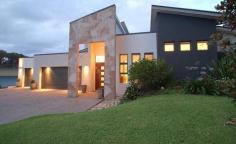 8-10 Kambah Pl Reedy Creek QLD 4227 STYLE FOR HARMONIOUS INDOOR/ OUTDOOR LIVING $999,000 Web property id: CBS583 Elevated within the heart of ‘The Observatory’, this master built Sanctuary 28 residence presents two levels of contemporary living appointed to the highest standards. Enjoy the peaceful park surroundings. • Beautiful formal lounge/dining area has spotted gum floors • Entertaining area enjoys a sparkling pool outdoor shower and park views • Caesar Stone bench tops, kitchen equipped with Smeg appliances • Family bedroom wing enjoys a stylishly appointed bathroom • Top floor main has an opulant ensuite and a large deck overlooking Surfers Skyline views. • Sounproof hobby/rumpus room plus an Italian tiled family living area • Air conditioned, Vacuum Maid, intercom and surround sound • Toowoomba sandstone paving plus landscaped gardens and lawn • Triple car garaging, plus extra space for a van/boat • Set on a 1,143sqm block opposite parklands Located within minutes drive to private and public schools, public transport, Varsity Train Station ,Local Shopping Centre and 20 mins to Burleigh Beach.