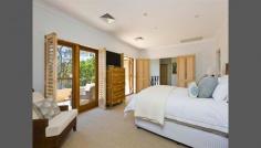 26a Coronation Avenue, Mosman, NSW 2088 Balmoral Beach Retreat - Resort-Style Gardens Reminiscent of a luxurious tropical resort, this incredibly private family retreat is tucked away in a secluded enclave overlooking idyllic Balmoral Oval. Created with a focus on alfresco living with all principal rooms opening outdoors, it has been designed to embrace a lush north facing garden oasis with heated pool and entertainer's cabana. It enjoys a tightly held dress circle setting on the Balmoral Slopes, just a short stroll to the beach, harbourfront dining and parkland. - Designed by award-winning firm Harrington Architects - Auto gated driveway access with video intercom security - 4 beds with built-ins, deluxe Saturnia stone baths - Private master suite with study, dressing room & terrace - Huge living room & formal dining room, Jetmaster fireplace - Sun drenched casual living wrapped in garden terraces - Gourmet granite gas kitchen overlooking the sparkling pool - Internal access to a double garage, gym, ducted air - Chic guest powder room, huge hidden laundry/utilities room
