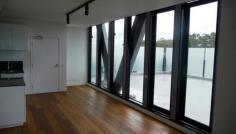 707b/10-16 Trenerry Crescent Abbotsford VIC 3067 This Unique One Bedroom Apartment is a must to inspect ! It is located at a new and exciting building "Riviere". This
one bedroom apartment come with huge balcony where you can invite
friends over for BBQ and an outdoor dining place during summer. Total
size of approx 122sqm is sure to impress ! This brilliantly
designed open plan apartment boasts state of the art kitchen with Blanco
stainless steel appliances, including gas cook top, electric oven and
dishwasher, large light and bright lounge overlooking private balcony,
spacious bedroom with mirrored built in robes, luxurious main bathroom
with chic fittings throughout, and European style laundry. Other
features include; stunning polished floorboards, carpeted bedroom, split
system heating and cooling, intercom entrance lift access, undercover
basement parking with remote access.