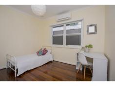 10 Joslin St Hilton WA 6163 Inspection by Appointment RENOVATED HILTON CLASSIC From the street, this Classic Hilton cottage looks deceptively small, but upon entering into the large open plan living/dining/kitchen area you will be pleasantly surprised. By removing some walls and opening up these living areas the owners have created a great feeling of openness and space and filled the whole area with beautiful light. The renovated kitchen has plenty of storage and bench top space, plus gas cooking and conveniently opens onto the large rear deck making it perfect for dinner parties and entertaining. Complete with air-conditioners in every bedroom, as well as the lounge, polished timber boards and high ceilings, this is the best of both worlds. All the charm and character of the classic Hilton cottage, combined with modern living to offer an ideal family home in this lovely community. There is a separate Powder room to the rear of the home, within easy access of the living and rear garden areas, ideal for use by guests. The master bedroom at the front of the home offers a full-length Floor-to-ceiling built-in robe and all three bedrooms are large enough to easily accommodate a queen size bed. The renovated bathroom is spotless and gives the home a fresh modern feel. The new lock-up garage is large enough for two cars, one behind the other, or one car plus plenty of storage. Situated across the road from a huge park with children’s playground, a shopping centre just up the road and a short drive to the centre of Fremantle or down to South Beach, this is an ideal location. For more information contact Rebekah on 0428 175 643.