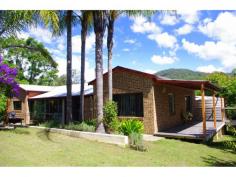 4639 Oxley Hwy Bagnoo NSW 2446 Private 14 Acres * Polished timber hardwood floors & 8 foot ceilings * Reverse cycle air conditioning, woodfire & ceiling fans * Open plan dining, lounge area approx 9m x 6m * Near new kitchen with woodstove & dishwasher * 3 of the 4 bedrooms have BIRs, 3 generous sized rooms * Modern bathroom with twin vanity * 9m x 7m open shed, 5000 gallon tank + 2 x 1000 gallon tanks * 4 spring fed dams, small creek gulley into Stoney Creek * Approx 15 mins to Wauchope on a sealed road, 35 mins to Port Macquarie Much information has been provided to us by third parties and we do not accept any responsibility for its accuracy. You should make your own enquiries and check the information so as to determine whether or not this information is in fact accurate. You must make your own assessment and obtain professional advice if necessary.