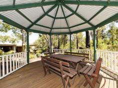 4415 Stoneville Road, Stoneville, WA, 6081 Excellent value, this family home is sure to impress. As you meander down the driveway you cant help but feel you are about to enter your own little world of privacy with the peaceful feeling of being out in the country & yet only 4.5km's from central Mundaring. The north facing, quality built, architect designed brick & Iron home boasts 300sqm of living space. Inside the first thing you notice is the soaring ceilings. The kitchen is perfect for those large family gatherings with heaps of benchspace, lots of cupboards plus a walk-in pantry that has its own workbench. There is also a new 'Emelia' 80cm Upright Cooker, dishwasher and large fridge/freezer recess.