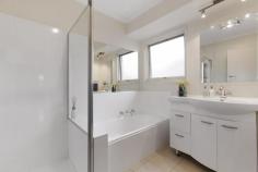 1/7 Cambridge Drive Glen Waverley VIC 3150 Fully renovated with stylish and contemporary elements, this stunning home offers a smart and flexible floorplan to meet the needs of a young family, first homebuyer or the astute investor. Fresh white walls and polished timber floors create a minimalistic feel while the central Caesarstone kitchen has been well-appointed to suit the busy chef to include both gas and electric cooktops by Miele. An adjacent, cleverly designed laundry also doubles as a butler's pantry. The spacious living room flows through to the kitchen/meals area and the three robed bedrooms share a central family bathroom. At the rear, you will find another two rooms which could be used as a 4th bedroom or second living area plus a separate study. And for the handy homeowner, the massive roof space has the potential to be converted into a loft or retreat area. Complete with gas ducted heating, split system air-conditioner, garden shed plus single garage, this home offers without a doubt, an undeniable level of convenience, with Pinewood Shopping, transport, local schools and freeway access only a stone's throw away!