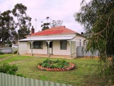 5 - 7 Compston Street, Goroke VIC 3412 Attractive home on 0.4 ha block in Goroke township Lounge with wood space heating, ceiling fan and ducted air con. Bright kitchen with gas range, range hood, B.I.C's, freshly painted 3 bedrooms, 2 with ceiling fans and ducted air con, 3rd. with ref air con Bathroom with bath and vanity 2nd bathroom/laundry with shower recess and heater fan. Undercover decking plus BBQ/ fernery area. 18' x 20' double garage with power. Garden shed, bird aviary, chook shed and fruit trees As new Solahart hot water system. Large rainwater tank and pressure system. Ideal property for a horse or small rural enterprise and close to main street and P12 school. Other features: Close to Schools,Close to Shops,Formal Lounge
