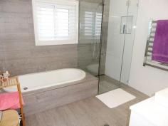 6 Ebsworth St Redhead NSW 2290 From the moment you step inside this lovely residence you will instinctively feel special and pampered. Everything that has been done here is to ensure that you and your family love the experience of living in this wonderful position. Lots of winter sunlight and summer coastal breezes and only 150 metres or so to the beach. Vistas down the coast to Swansea Heads. Expansive open plan living areas opening to the view deck and private rear courtyard leading up to the secluded pool and poolside entertaining area. Upper level features a very large master suite incorporating a well laid out home office and very large ensuite bathroom plus 2 guest bedrooms and the main bathroom. On the lower level is the 4th bedroom, 3rd bathroom, rumpus/retreat, gym room and generous double garage. Provision has been made for a lift to be installed if required and nothing has been left to the imagination. We're very happy to be representing the owners in the sale of this beautiful home. (We have obtained all information in this document from sources we believe to be reliable; however, we cannot guarantee its accuracy. Prospective purchasers are advised to carry out their own investigations.) Property Features Built-In Wardrobes • Garden • Polished Timber Floor • Secure Parking • Swimming/Lap Pool • Terrace/Balcony • Website Featured Property •