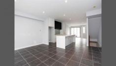 9/25 Boathouse Drive Caroline Springs Vic 3023 Luxurious Living By The Lake! Live surrounded by beautiful parks and wide open spaces in this brand new three level town house. When you enter you will be pleasantly surprised by the space and quality. Full of natural light this property comprises of: 3 good sized bedrooms, main with massive walk in robe, other 2 bedrooms with large built in robes 3 spacious bathrooms, ensuite to main bedroom with huge double shower and double basin 2nd level has a large open plan living / kitchen / dining area Kitchen has an abundance of bench & cupboard space, stainless steel appliances and a dishwasher Remote double lock up garage with internal access & built in storage cupboards Other features include split system heating and cooling to all rooms, fully automated home system including automatic and touch lighting, separate laundry, a private balcony on level 2 with views of the town, ample storage space and a small secure courtyard with very low maintenance. Perfectly located in the heart of Caroline Springs with the waterfront, town centre, parks, schools, public transport, restaurants & entertainment district only a short walk away. You and your family will enjoy living in this brand new modern home. For inspection times please contact Chiara Harrington from Ray White Hawthorn on (03) 9831 8940 or chiara.harrington@raywhite.com. To view all available rental properties with Ray White Hawthorn please go to www.raywhitehawthorn.com.au