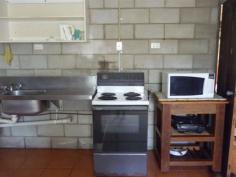 261 SEXTON Highway Brandon Qld 4808 Quality block home, with machinery sheds, on 9210 sqr mtr block. - Quality block, 2 year old home (over 400 sqr mtrs). - Quality tiles, fully airconditioned. - Brilliant Tassie Oak kitchen. - 3 large bedrooms + office or 4th bedroom. - Verandahs on all 4 sides. - Machinery sheds (15 bays) with accommodation (suitable for harvester & haulouts). - Situated on the edge of town. A copy of the Sustainability Declaration is available for viewing at our office. - See more at: http://www.landmarkharcourts.com.au/Property/582821/LTY2946/261-Sexton-Highway#sthash.hnFawxJj.dpuf