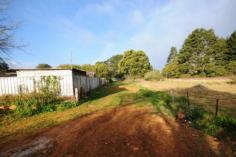 91 Hoddle Street Robertson NSW 2577 Web ID : 1667004 Price : $950,000 WIWO Property Type : House Sale : Private Treaty Land Size : 1226 Sqms Investment Opportunity! 6 2 2 Zoned B2 Local Centre constructed of brick and timber with an iron roof. Presently a General Store/Newsagency and small Gift Shop. Above the General Store/Newsagency - 2 bedroom flat with living area, kitchen and bathroom. The Gift Shop with smaller shop front features a 4 bedroom flat behind and above. Consisting of large lounge room, kitchen, laundry and utility room below and upstairs four bedrooms, bathroom and separate w/c and a wide balcony across the upstairs section. Verandah at street level, tandem style double garage (drive through). Back yard with access from laneway (at present access not legal is via the hotel adjoining driveway).