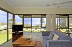 59 Gordon St Guilderton WA 6041 'Moore To Sea' The 'Moore To Sea' beach house at 59 Gordon Street truly captures the essence of what the small coastal town of Guilderton / Moore River is all about...a great place for 'digital detox', relaxation and reconnecting with the family without the stress of your everyday lifestyle.. Perfectly positioned just across from the round-a-bout (on the corner of Gordon & Edwards Street) that leads down to the foreshore, there is a great view of the ocean and estuary with the river, beach, General Store / Cafe and the Country Club and sporting facilities only a few minutes walk away - no need to get in the car 'til you leave! The light and cheerful coastal home is well maintained and offers a highly functional layout with a nautical vibe. The presentation is excellent - this is low maintenance holiday living at it's very best. A private rear deck in a peaceful landscaped garden setting completes the picture perfectly whilst a lovely front veranda will allow you to catch the breeze and take in the view. If you've been looking to combine the purchase of a holiday home with your long term investment plans, this is an excellent proposition as 'Moore To Sea' is one of the most popular short term rentals in Guilderton, generating a consistent return and repeat clientele year after year. Best looking, best position and best value - be quick for this one! Please call Marg (0429 808 146) to arrange your own private viewing.