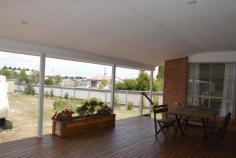 47 Rosebery St Tarago NSW 2580 Offered for the first time ever this brand new house This is an ideal opportunity to secure a life-style of tranquillity amidst the beautiful countryside, with the picturesque rolling hills of Tarago as a backdrop. This spectacular family home is only 22 minutes from Bungendore, 27 minutes from Goulburn and 50 minutes from Canberra's CBD. This property is ready to be lived in and loved, nothing to do but unpack as you cross the threshold. Features include: Wrap-around deck Rear entertaining area ideal for bbqs and outdoor dining 7x4 metres Master bedroom with ensuite and walk-in robe Second and third bedrooms both double-size, one with built-ins. Second toilet and bathroom all with frameless showers and modern vanities Huge internal laundry with storage Stunning bamboo flooring Gas kitchen and oven Open-plan, spacious living and kitchen areas with ample room to cook and entertain Double lock-up garage with remote access Back yard work shed (man-cave) with solid slab and strong steel structure Two 25000 ltr water tanks The latest in sceptic tank technology Lighting includes latest LED technology which is very economical Room at the back to create your own little eco-haven of herbs, veggie patches and even a chicken coup. The house is set on 1416sqm block with front and rear lane access. The house, almost 200sqm in internal space, is constructed on a solid, well-insulated concrete slab, with a treated timber frame and colourbond roofing. This house is well-insulated making it very energy efficient, cool in summer and warm in winter. This property will impress the most fastidious of home owners. Its quality finishes and attention to detail make it a rare find in such a welcoming locale. So whether you are looking for a healthy life-style for the family or finally making a tree-change, this home is not be missed as it won't last long. Property: House Bedrooms: 3 Bathrooms: 2 Parking: 2 Land Size: 1416 Sqm Features: Barbecue Area Local Amenities: Railway Station Playground Park Zoning: Village Council: Goulburn Mulwaree