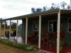 29 Ellerington Lane Amiens Qld 4352 Located just minutes from Stanthorpe this very neat 44 acre block offers
privacy and comfort to enjoy the view, the wildlife and all that this
district has to offer. The steel framed 28 x 7m house started its life
as a shed but has been transformed into a comfortable 2 bedroom home
nearly two years ago by a reputable builder with council approval.
Featuring extensive insulation throughout, quality carpets and tiles,
double glazed windows and doors, wiring for PC network, Foxtel and NBN
ready, a 5.25KW Solar System with 21 panels, solar hot water and 2 x
5000 gallon rainwater storage tanks. The property is nearly all fenced
with 3 dams (1 springfed), mountain views right across to Bald Rock
National Park, walking tracks and an abundance of wild flora and fauna.
Offering a lifestyle many only dream of, this property could be yours.
Contact Sally Rowen on 0417 633 969 to arrange an inspection.