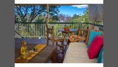 31 Glenrosa Rd Red Hill QLD 4059 Beautiful Cottage With Elevated Views This charming character filled inner city residence offers a ready to enjoy lifestyle with the best of Red Hill at your doorstep. Ready to move in, with an option to further develop if desired, this home is the perfect choice for professionals or small families. The inviting interior highlights three bedrooms, open plan living/dining area complete with high ceilings, breezeways, polished timber floors and modern kitchen. Step outside to entertain on a delightful rear deck with beautiful panorama views that capture surrounding greenery and cool breezes. At a glance: Open plan living and dining Kitchen with stone benches, walk-in pantry & Bosch appliances Three bedrooms, two with built-in robes Modern bathroom Original features include; VJ walls, breezeways, high ceilings, polished timber floors & timber casement windows Ceiling fans and reverse cycle air conditioning French doors open onto a N/E facing entertaining deck that overlooks a lovely low maintenance garden Laundry and storage area underneath house Off street parking for 2 cars Situated on 630m2 allotment 3.7kms from CBD Prime location only moments to transport, cafes, restaurants, shops, parks, & close to some of Brisbane's best schools