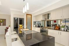 70 Brookwater Circuit Colebee NSW 2761 Prestigious Stonecutters Ridge - Open For Inspection Saturday 30th 11am-12pm This stylishly appointed home was built by a vendor with a great eye for detail and unrestrained expense in achieving a finish that must be viewed to be appreciated. With the highest of quality finishes and upgrades in every room, you will be impressed by the positive feeling you get with this open planned, sunshine filled residence. The property is located within the award winning Stonecutters Ridge Estate and enjoys an convenient central position within easy walking distance to the award winning Stonecutters Ridge Golf Club. Stonecutters Ridge is a stunning residential development located in Colebee, featuring Sydney’s first Greg Norman designed championship golf course and an impressive new Clubhouse (winner of 2012 Master Builders Association Award).