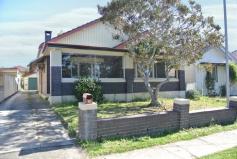 215 Auburn Road, Auburn NSW 2144 You will be captivated by its character & charm from the very moment you step inside this lovely 2 bedroom full brick home plus sunroom or potential 3rd bedroom set in the heart of downtown Auburn on a decent size block of land 12.19 x 45.72 = 557 sqm, within a short walk to Auburn Central Shopping, school and centrally located to Auburn, Lidcombe & Berala station.