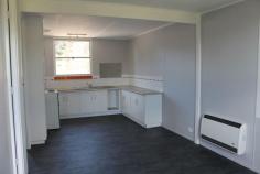 21/23 Sophia St Tullah TAS 7321 Property Information Situated in the lakeside town of Tullah this beautiful property offers everything. Freshly renovated two bedroom with separate lounge and open dining/kitchen area. New carpets, fresh paintwork, new roof, upgraded meter box and modern updates. Tastefully set on large block of 1151sqm. Plenty of room for the boat, caravan and cars. Also on the block is a large fully lined shed with glass sliding doors and electric wall heating. Easily converted into additional living area or large family rumpus and office. The block is fully fenced and receives plenty of sunlight for sitting to enjoy the views of Mt Murchison and Mount Farrell. Call to discuss further or to arrange inspection. Land Size 1151 sqm Approx year built 1975 Property condition Renovated Property Type House House style Bungalow Garaging / carparking Off street Construction Cladding Joinery Aluminium Roof Iron Insulation Ceiling Walls / Interior Panel sheeting Flooring Carpet and Other (Vinyl) Heating / Cooling Electric Property features Smoke alarms Chattels remaining Electric wall heater, Fixed floor coverings, Light fittings, Stove, TV aerial Kitchen Standard, Open plan, Upright stove, Extractor fan and Pantry Living area Separate dining, Separate living Main bedroom Double and Built-in-robe Bedroom 2 Double and Built-in / wardrobe Additional rooms Rumpus (Heating / air conditioning) Main bathroom Bath, Separate shower Laundry Separate Views Urban Aspect South Outdoor living Entertainment area (Covered) Fencing Fully fenced Land contour Flat Grounds Tidy Water heating Electric Water supply Town supply Sewerage Mains