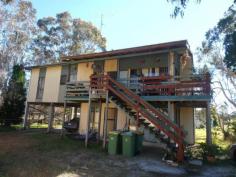 10 Impey Ave Tin Can Bay QLD 4580 The price has just been dropped on this 'NOT TO BE MISSED" opportunity to purchase a house (it is two separate units at the moment) at an unbelievably low price!! At the moment the property is used as two units, the upstairs unit has three bedrooms, and the downstairs unit has two bedrooms. Both units are in need of renovation to bring them up-to-date. Presently they are rented out at $185/week upstairs and $175/week downstairs. If renovated you could bring the rents up to say $220/week upstairs and $200/week downstairs. Location is superb - one street back from the beautiful Tin Can Bay foreshore. If you didn't want to keep them as units the property would make an excellent family holiday home. These opportunities don't come along very often - call Janet TODAY!! Features Fenced Safety Switch Outdoor entertainment area Smoke Alarms Property Details Bedrooms 5 Bathrooms 2 Car Ports 2 Contact Details Agent: Janet Young Mobile: 0438 587 239
