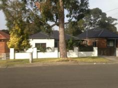 10 Warejee Street Kingsgrove NSW 2208 This well presented family home offers 3 bedrooms of accommodation all with built in wardrobes, modern kitchen with stainless steel appliances and gas cooktop, polished timber floorboards, A/C, external laundry with 2nd toilet, large backyard with rear access to the park, single lock up garage. Located only walking distance to all local amenities such as public transport, shops and schools.