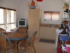 12 Eighth Ave Raymond Island VIC 3880 CUTE COTTAGE ON RAYMOND ISLANDCharming timber cottage on large allotment situated close to the lake. The main home comprises open plan living with high ceiling, split system, three bedrooms, (third bedroom is a loft bedroom), bathroom and laundry. Large undercover alfresco area for outdoor living and BBQ. There is also a shed which has been lined and includes a shower and toilet, perfect for guest accommodation. Fantastic holiday home.