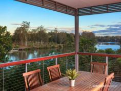 30 Sonanne Pl Fig Tree Pocket QLD 4069 Grand river views that encapsulate both a wide expanse of water and the
verdant beauty of Sherwood Forest Park provide a fittingly dynamic
backdrop to this immaculately presented and very private flood free
near-new home.
Sophisticated and elegant, comprehensive design elements are proudly on
show throughout the entire property, with all rooms oriented Northeast
and of generous proportion. Great attention has also been paid to
creating an abundance of natural light while still maintaining total
privacy. This has been achieved through the use of dense boundary
hedging, a proliferation of well-positioned windows and the utilisation
of courtyard gardens.The finishes also lend themselves to a quiet
sophistication, with Spotted Gum hardwood flooring and sealed Travertine
used extensively throughout, along with Caesarstone, stainless steel
and glass. All these elements come together in the open plan living
space, where a dynamic combination of design features not only provide a
highly functional area to live and entertain but also an impressive
visual scene, thanks largely to an entire wall of glass that fully
encapsulates the river views.