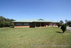 Tarzali, QLD 4885 Discover everything you could wish for and more at this immaculate property on 2 hectares (5 acres) at picturesque Tarzali. Quality finishes and fittings reflect the care and attention to detail that have been employed outfitting this spacious four-bedroom clay brick home. Generous dimensions, internal intercom and ducted vacuum systems, elegant granite bench tops in the bar, large 2-pack kitchen and three bathrooms; kerbed bitumen driveway, double garage with remote control doors, computer controlled sprinkler system and dedicated rooms for mower and 32kva generator give a broad indication of what this extensive home offers. Take in spectacular views from tiled verandahs that provide generous outdoor living and entertaining space. Wander down to the acre of rainforest while you contemplate tinkering in the workshop or taking the tractor and slasher for a spin. Only an inspection will adequately illustrate all the advantages this property displays – book yours today! Clay brick; lowset 4 bedrooms; 3 built ins Large WIR/dressing room 2 bathrooms + 1 ensuite 2 lounges Verandah Bar Ceiling fans Fireplace Ducted vacuum Intercom Double garage + store Bore Views 6x6 CB shed 32kva generator 5kw solar panels