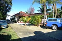 53 Kirkham rd Auburn NSW 2144 THIS LARGE FOUR BEDROOM PERMALUM/TILE HOME TASTEFULLY DECORATED THROUGHOUT OFFERING LARGE LOUNGE AND LIVING ROOM, MODERN KITCHEN, 2 BATHROOMS. SET ON A MASSIVE BLOCK OF LAND 19.58 X 52.27 = 1023.44 SQM. ZONE R3 TOWNHOUSE DEVELOPMENT SUBJECT TO COUNCIL APPROVAL 5 TO 6 TOWNHOUSES.