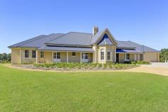 12 Bayfield Rd Galston NSW 2159 Luxurious Acreage! Energise Your Senses With This Home Of True Grandeur. Located just moments away from the heart of Galston and situated on 4.35 acres of land. From the rear of the property your views are loaded with all avenues of nature taking you away from the hustle and bustle of city life. This home is architecturally designed and no cost has been spared. The incredible "WOW" factors being highlighted in the most tasteful way. INTERIOR FEATURES: - Huge master bedroom with dual access walk-in wardrobe leading to luxurious private bathroom. Double exterior doors leading to paved balcony enjoying the tranquil views. - 5 King size bedrooms each with en-suite (2 with spa baths). - Savannah-style plantation shutters. - Kitchen with brand new European quality stainless steel gas appliances, twin dishwashers, stone bench-tops, 2 integrated ovens, fridge/freezer x 2 and coffee machine. - Separate combined preparation kitchen and pantry. - Extensive formal and informal living areas with realistic gas fireplaces. - Full size wet-bar with adjoining games room. General Features Property Type: House Bedrooms: 6 Bathrooms: 6 Land Size: 1.76ha (4.35 acres) (approx) Outdoor Features Garage Spaces: 7