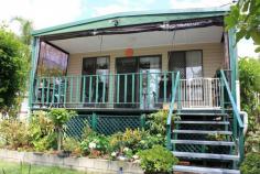 Tivoli QLD 4305 This delightful mobile home has been lovingly cared for by the current owners and is now presented for sale. Here is an opportunity to secure your little piece of paradise located on a prime site at the Ipswich Caravan Village. There are no age limits here - anyone can take advantage of this opportunity to secure your future and live in this idyllic setting. The site is located on the eastern edge of the village offering unobstructed views to the east through the trees. The current site includes the relocatable home, a double carport, separate laundry shed, garden shed, established gardens and views. Being located near the top of Tivoli hill - this property is flood free. * Well maintained fully insulated Ranger Relocated Home * Two bedrooms with fans & ample built-in robes/storage * Master bedroom with aircon, fan and additional walkin robe * Separate study with fan, built-in cupboards/shelving * Modern galley kitchen with gas cooking and breakfast bar * Spacious open plan living / dining with aircon * Two way bathroom with storage cupboard * Private front east facing deck with views & shade/privacy blinds * Two car carport / entertaining area plus garden shed * Current site agreement includes 700sqm of land